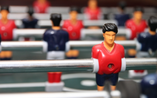 a closeup shot of foosball board